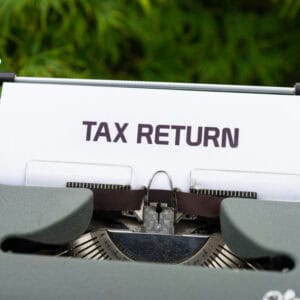 Tax report on paper typewriter