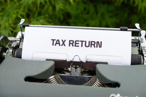Tax report on paper typewriter